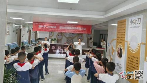 德安一小学生参加中医文化宣传活动 组图
